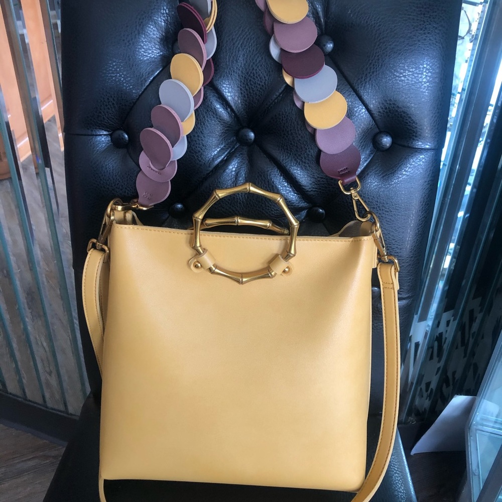 Beautiful mustard crossbody leather bag.